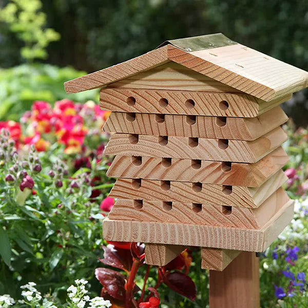BlossomGuardian wild bee hotel positioned in a garden